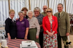 Society-officials-cutting-the-official-centenary-cake